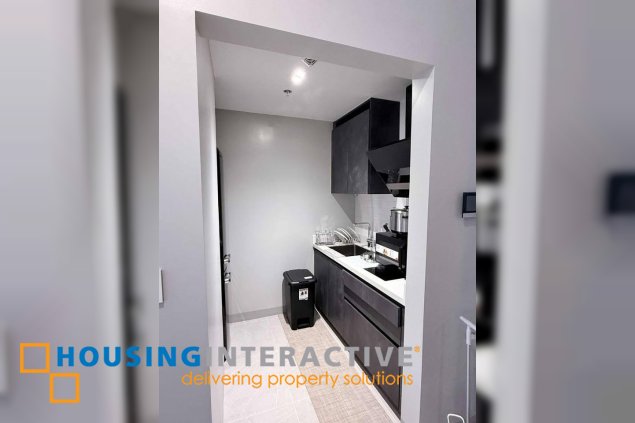 fully furnished studio unit with balcony for lease in uptown arts residence