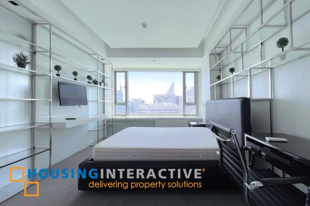 furnished 1br unit with balcony and parking for sale in alphaland makati place
