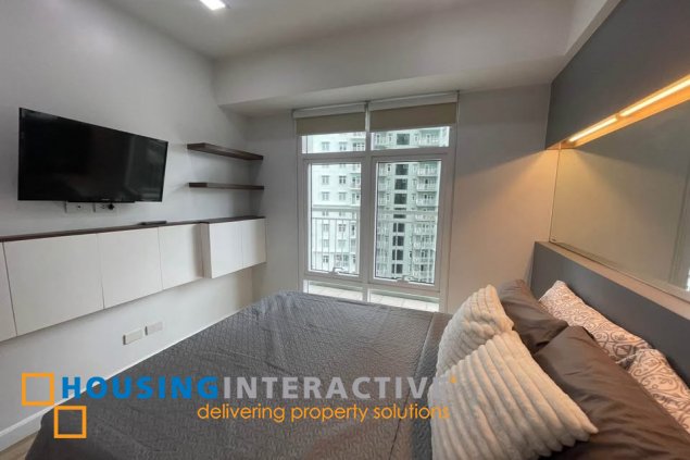 fully furnished 1br unit with balcony and parking for lease in two serendra