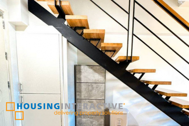 fully furnished 2br unit with parking for sale in one rockwell