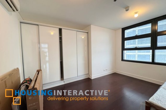 bare 1br unit with parking for sale in garden towers