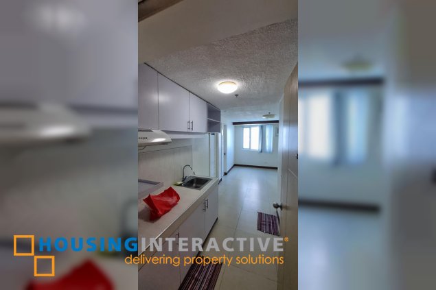 bare 2br unit with parking for sale in mplace residences