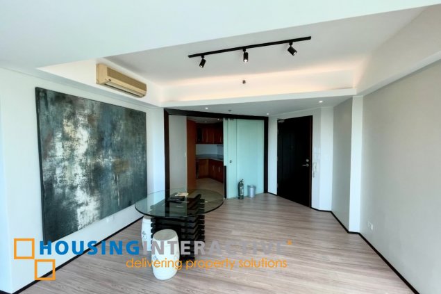 semi-furnished 2br unit with parking for lease in bonifacio ridge