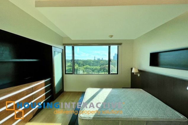 semi-furnished 2br unit with parking for lease in bonifacio ridge