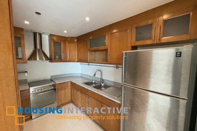 semi-furnished 2br unit with parking for lease in bonifacio ridge