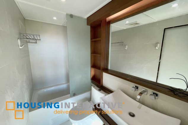semi-furnished 2br unit with parking for lease in bonifacio ridge