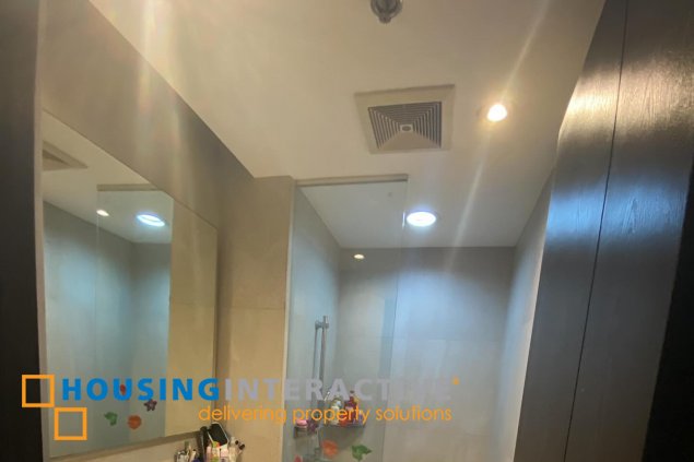 fully furnished 2br unit with parking for sale in the residences at greenbelt