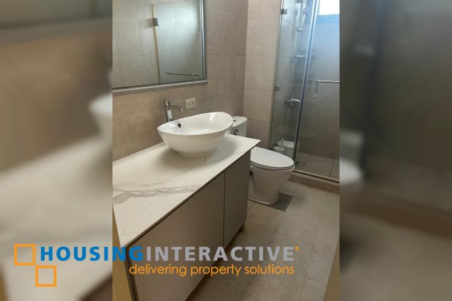 furnished 2br unit with parking for sale in one legaspi park