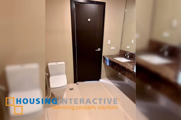 semi-furnished 3br unit with parking for sale in garden towers