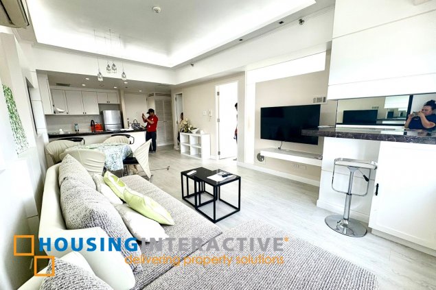 furnished 1br unit with balcony for lease in the infinity tower