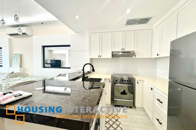 furnished 1br unit with balcony for lease in the infinity tower