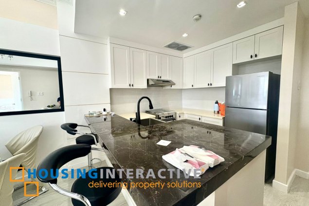 furnished 1br unit with balcony for lease in the infinity tower