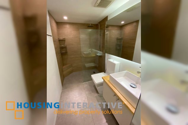 fully furnished 2br unit with parking for rent in one rockwell