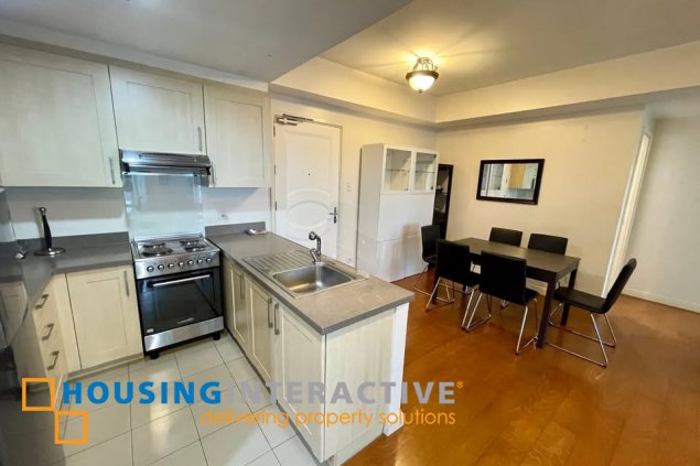 fully furnished 2br unit with parking for sale in one rockwell