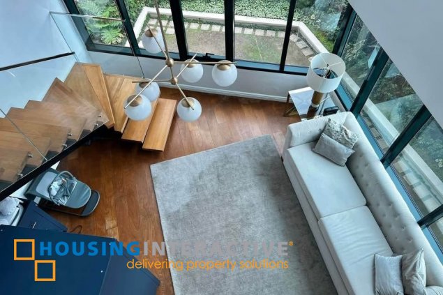 semi-furnished 1br unit with parking for sale in one rockwell