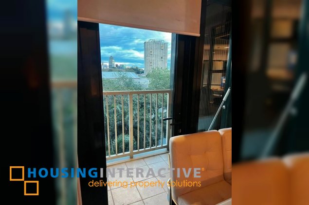 semi-furnished 1br unit with parking for sale in one rockwell