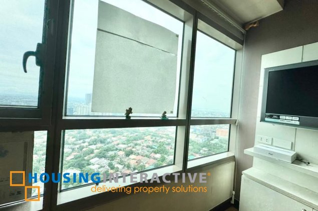 semi-furnished 3br unit with parking for sale in the residences at greenbelt