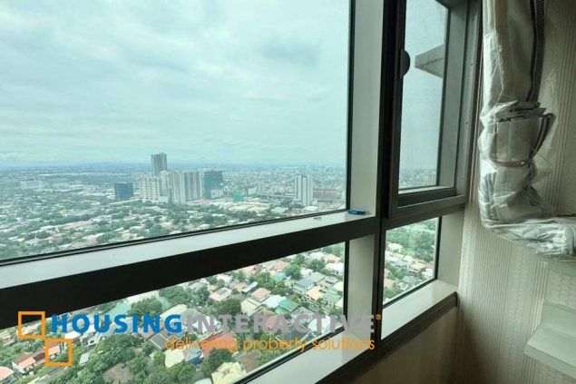 semi-furnished 3br unit with parking for sale in the residences at greenbelt