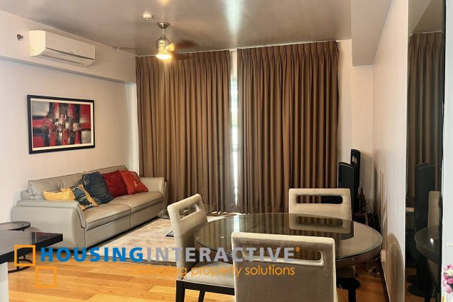 fully furnished 1br unit with parking for sale in one serendra