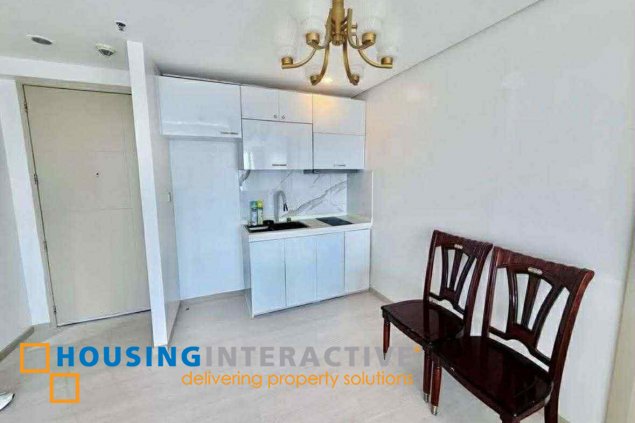 semi-furnished 2br unit with parking for sale in bellagio two