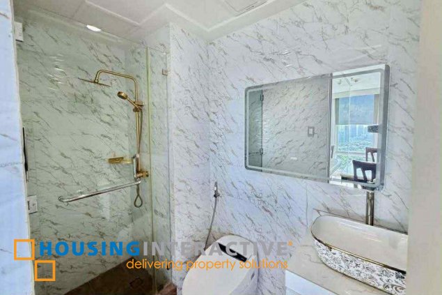 semi-furnished 2br unit with parking for sale in bellagio two