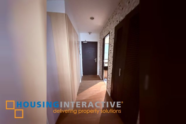 bare studio unit with parking for sale in two serendra
