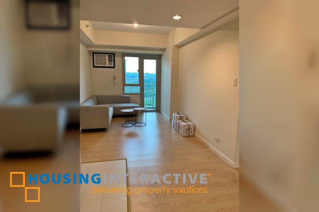 fully furnished 1br unit with parking for sale in the grove by rockwell