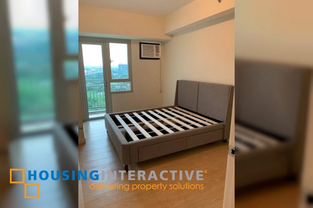 fully furnished 1br unit with parking for sale in the grove by rockwell