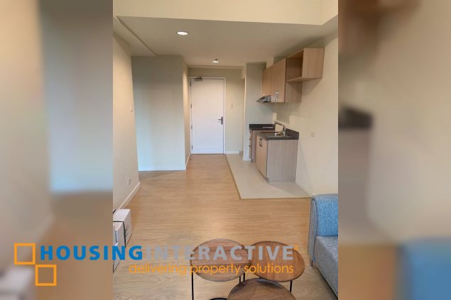 fully furnished 1br unit with parking for sale in the grove by rockwell