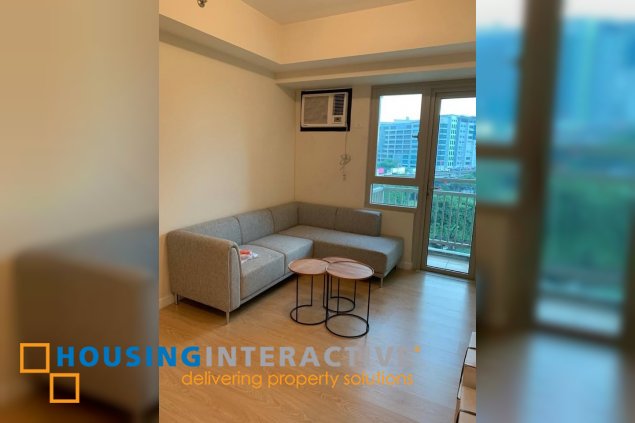 fully furnished 1br unit with parking for sale in the grove by rockwell