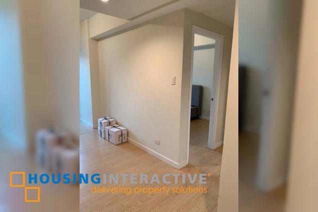 fully furnished 1br unit with parking for sale in the grove by rockwell