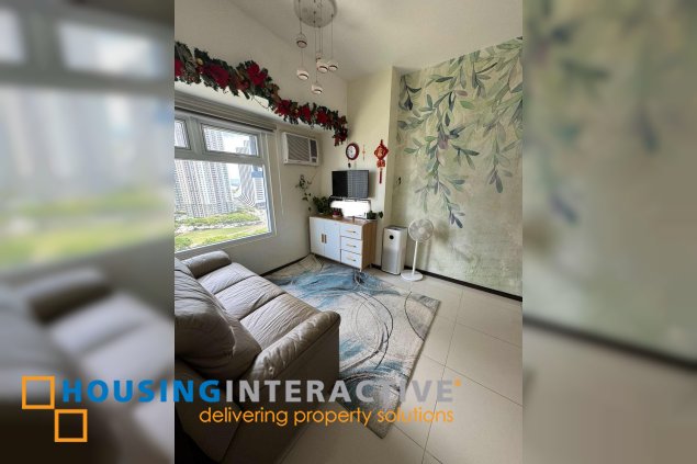 fully furnished 1br unit for sale in the trion towers