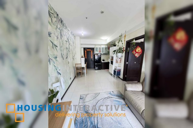 fully furnished 1br unit for sale in the trion towers