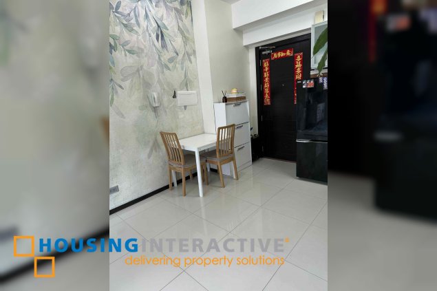 fully furnished 1br unit for sale in the trion towers