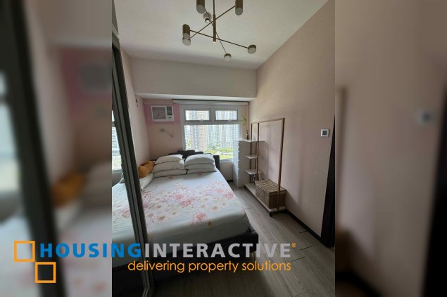 fully furnished 1br unit for sale in the trion towers
