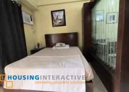 fully-furnished studio unit with partition and parking slot at paseo parkview suites for rush sale