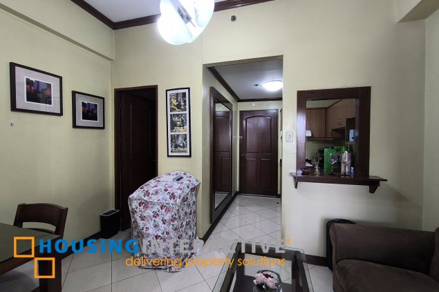 fully-furnished studio unit with partition and parking slot at paseo parkview suites for rush sale