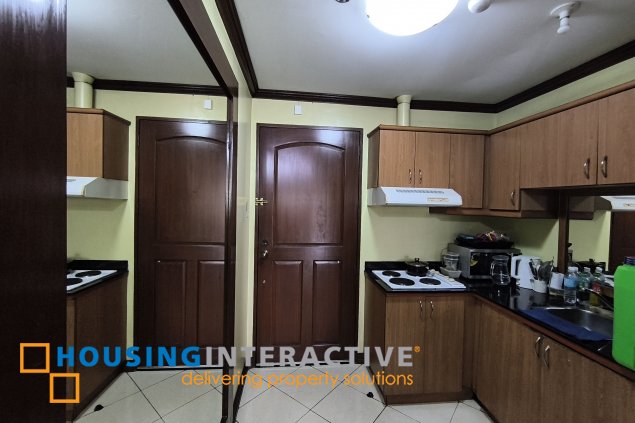 fully-furnished studio unit with partition and parking slot at paseo parkview suites for rush sale