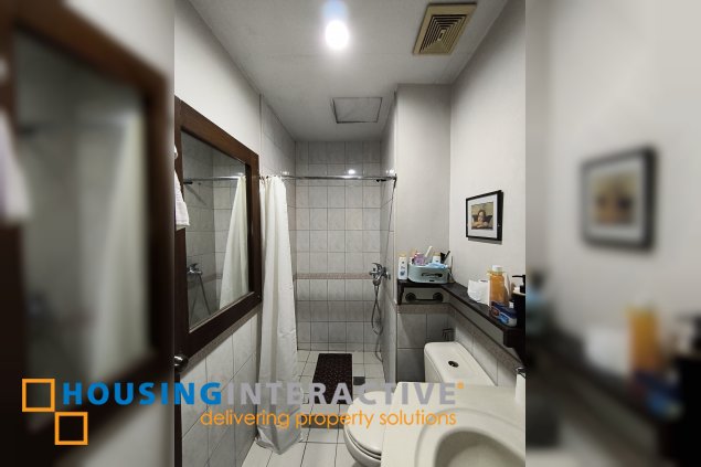 fully-furnished studio unit with partition and parking slot at paseo parkview suites for rush sale