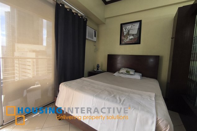 fully-furnished studio unit with partition and parking slot at paseo parkview suites for rush sale