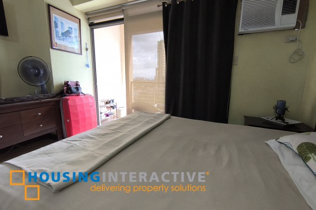fully-furnished studio unit with partition and parking slot at paseo parkview suites for rush sale