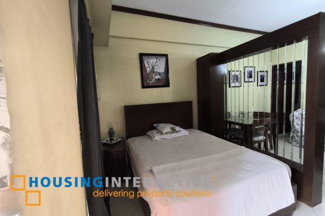 fully-furnished studio unit with partition and parking slot at paseo parkview suites for rush sale