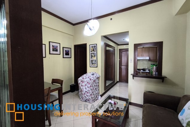 fully-furnished studio unit with partition and parking slot at paseo parkview suites for rush sale