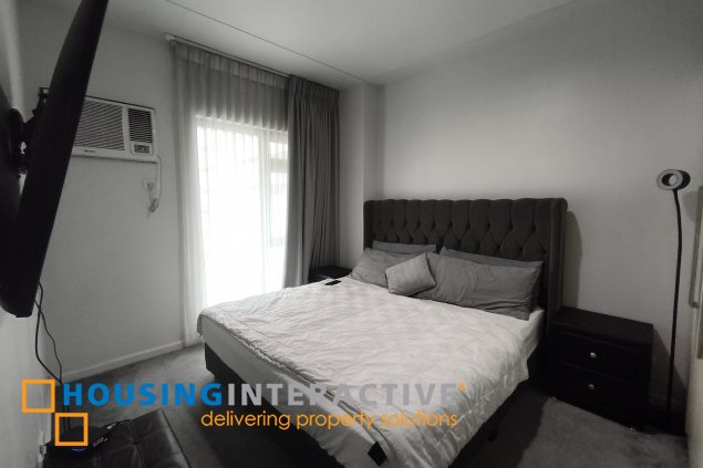 fully-furnished 1 bedroom condo unit with a huge balcony/terrace at solstice towers at circuit makati for sale