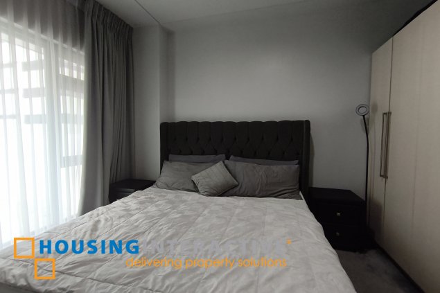 fully-furnished 1 bedroom condo unit with a huge balcony/terrace at solstice towers at circuit makati for sale