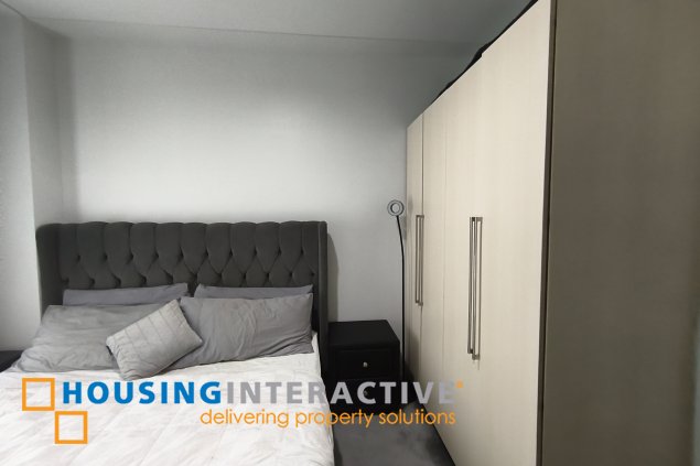 fully-furnished 1 bedroom condo unit with a huge balcony/terrace at solstice towers at circuit makati for sale