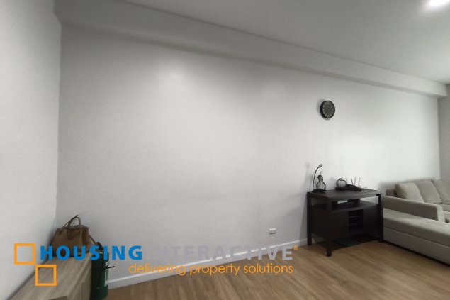 fully-furnished 1 bedroom condo unit with a huge balcony/terrace at solstice towers at circuit makati for sale