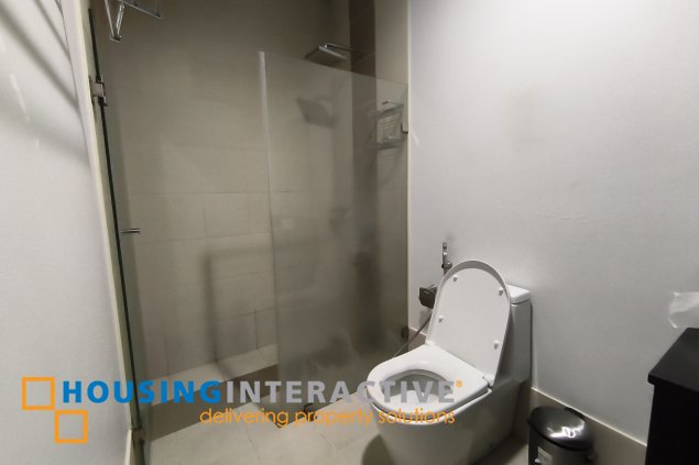 fully-furnished 1 bedroom condo unit with a huge balcony/terrace at solstice towers at circuit makati for sale