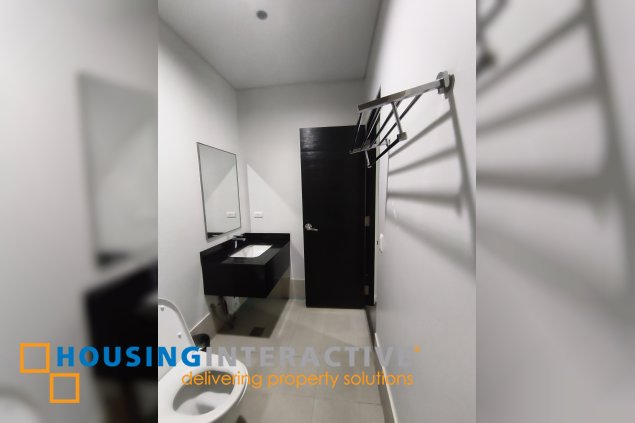 fully-furnished 1 bedroom condo unit with a huge balcony/terrace at solstice towers at circuit makati for sale