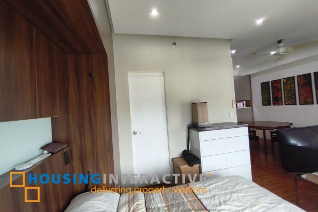 fully-furnished studio unit with parking slot at anaheim tower in the levels by filinvest